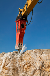 A Promove XP7000 breaker breaking the rock face of a quarry