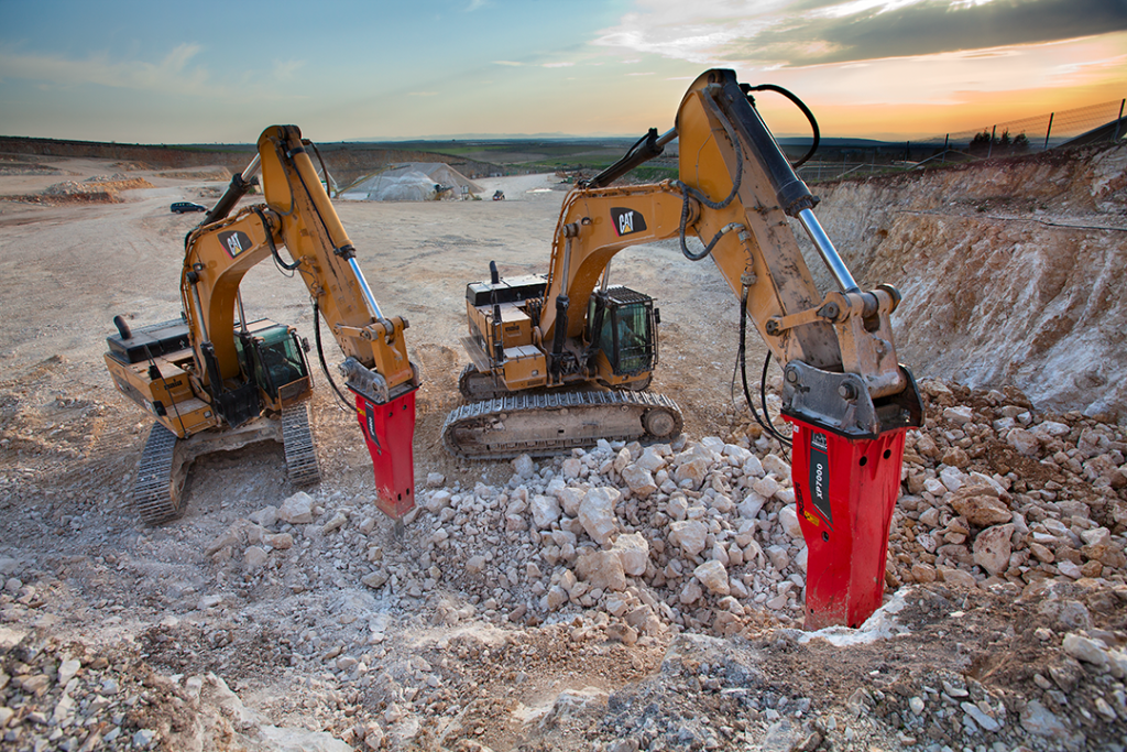 Two Promove XP7000 breakers and CAT excavators in a lime stone quarry in Italy